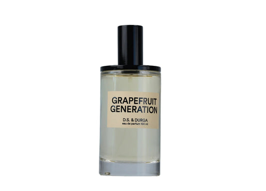 Perfume bottle labeled 'Grapefruit Generation' by D.S. & Durga on a gray background